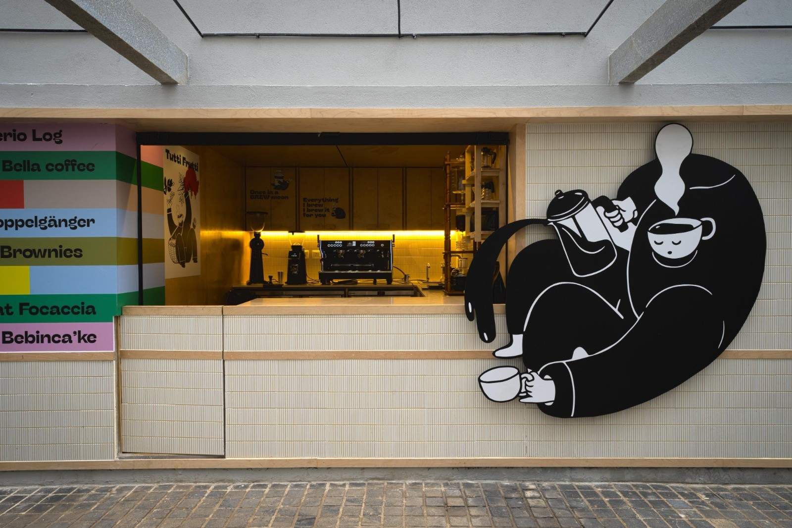 P.U. Ding Ding cafe storefront at Whitefield