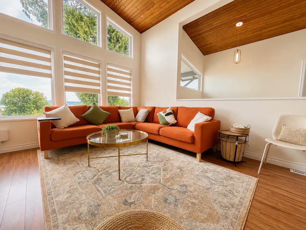 Living room with orange sofa